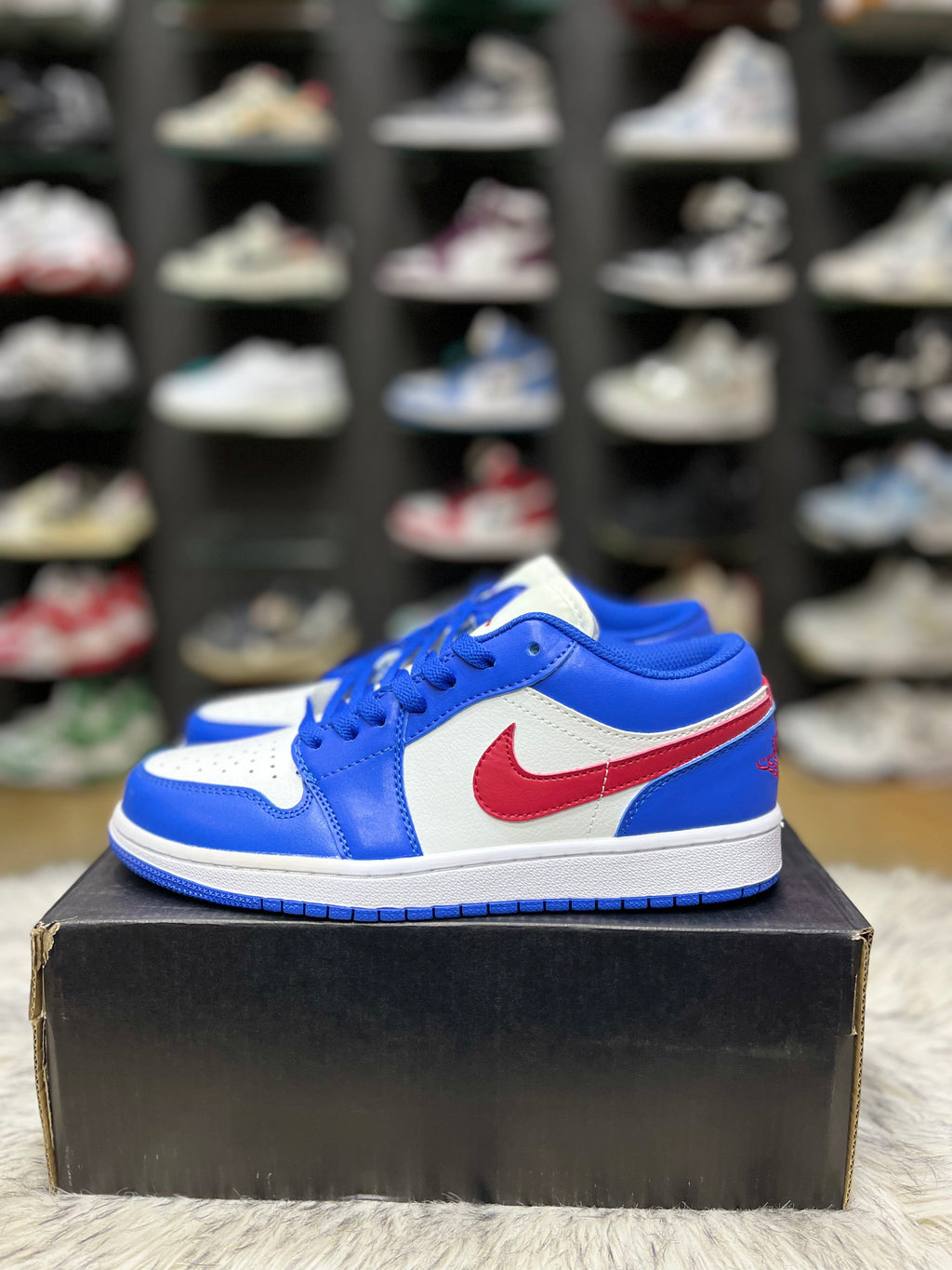 Nike Air Jordan 1 Low sneaker in a sport blue and white