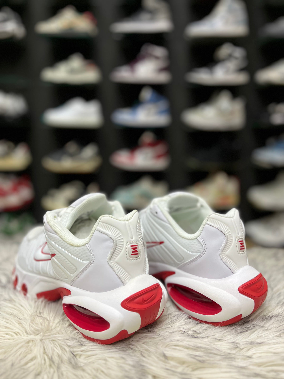 white and red Nike Air Max Plus TN Utility sneakers