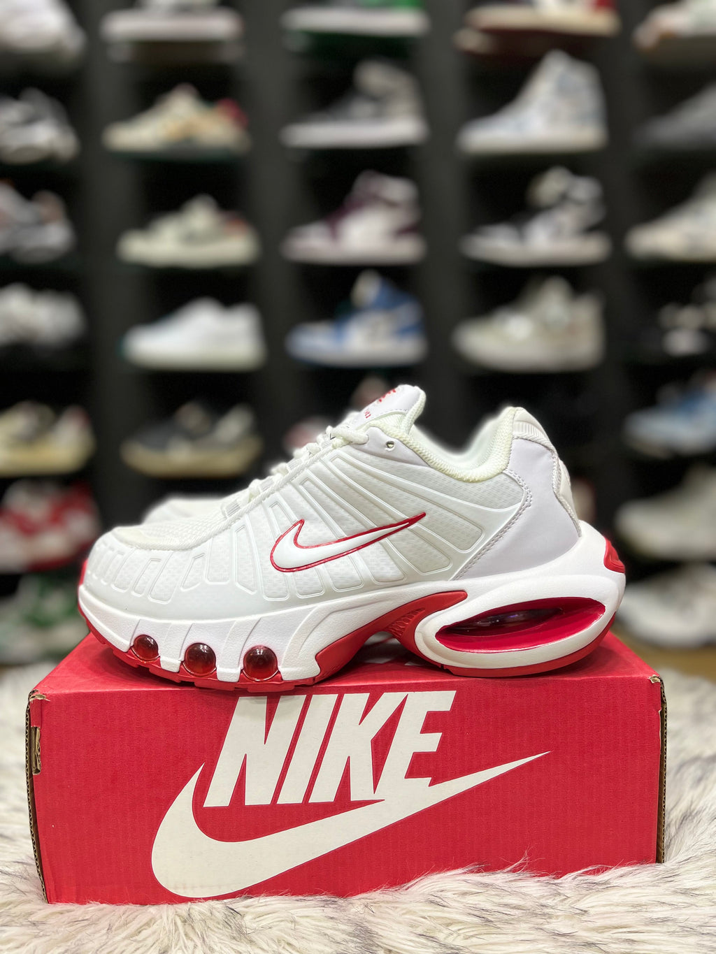 white and red Nike Air Max Plus TN Utility sneakers