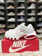 white and red Nike Air Max Plus TN Utility sneakers