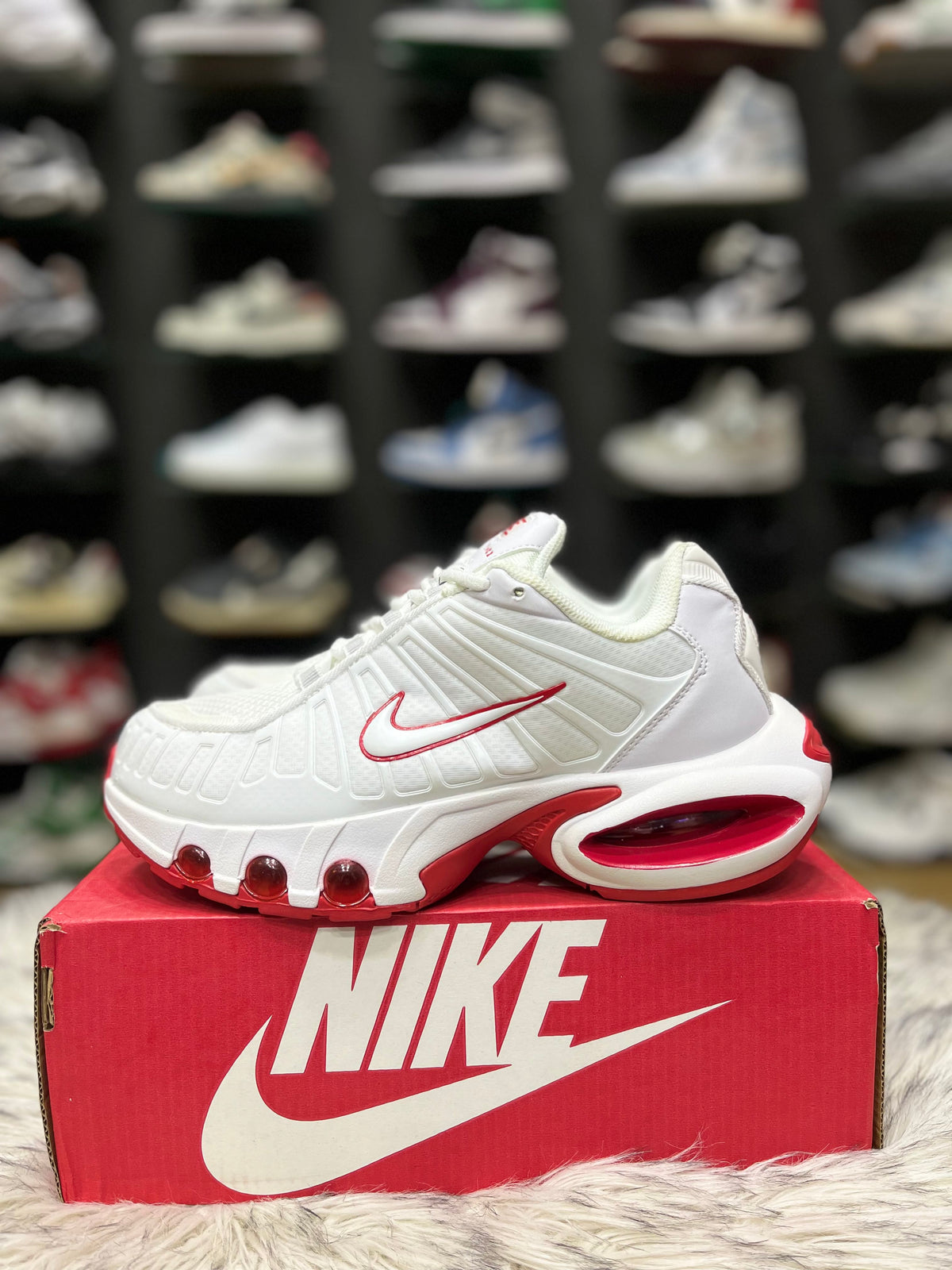 white and red Nike Air Max Plus TN Utility sneakers