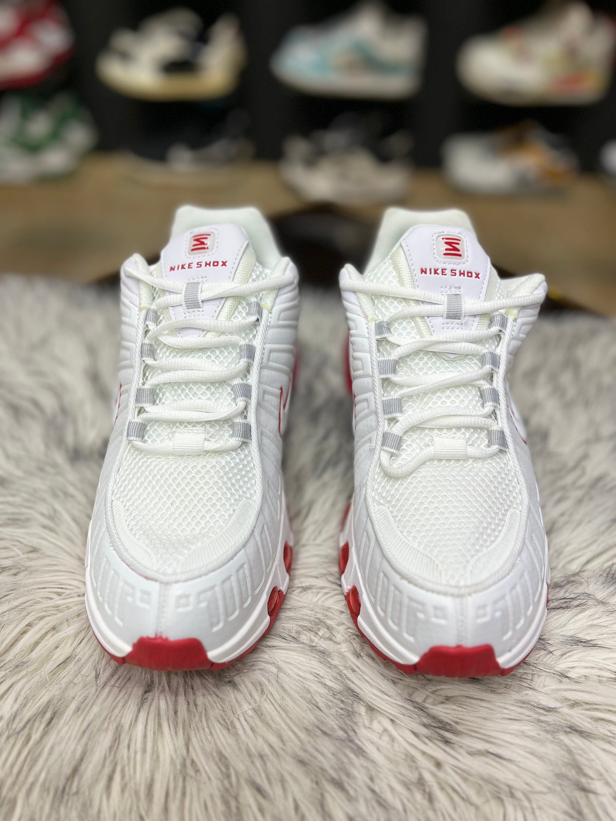 white and red Nike Air Max Plus TN Utility sneakers