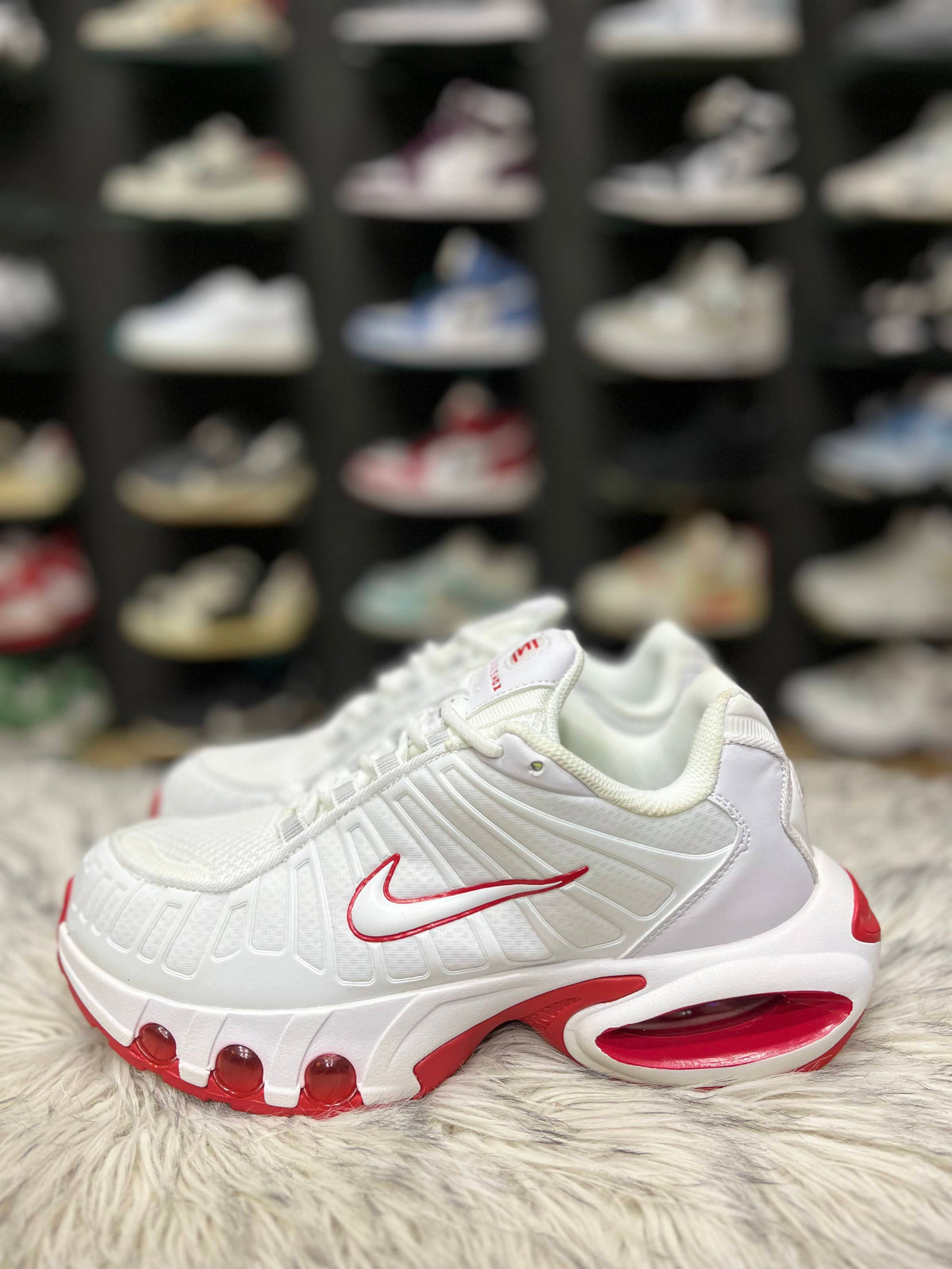 white and red Nike Air Max Plus TN Utility sneakers