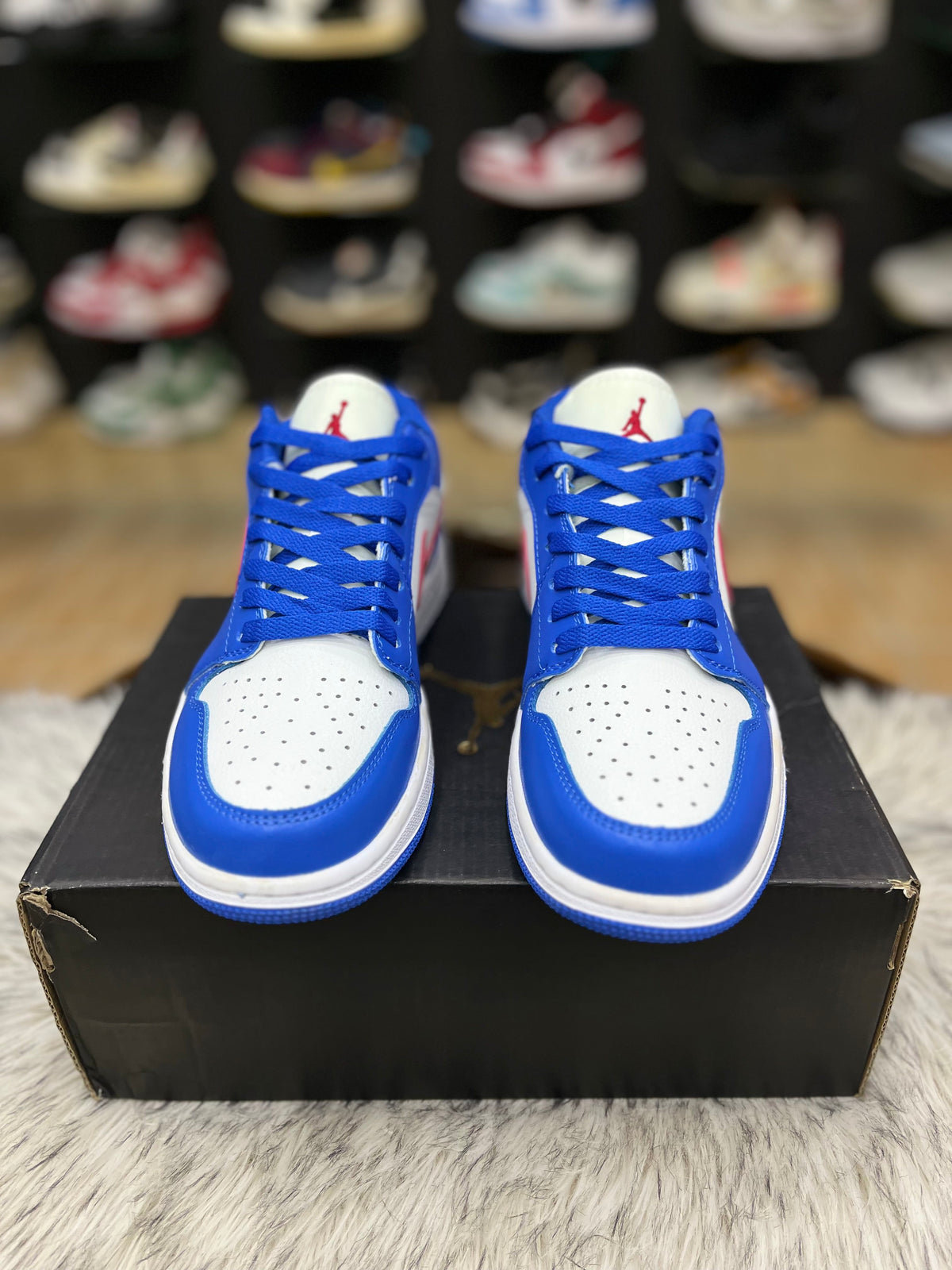 Nike Air Jordan 1 Low sneaker in a sport blue and white