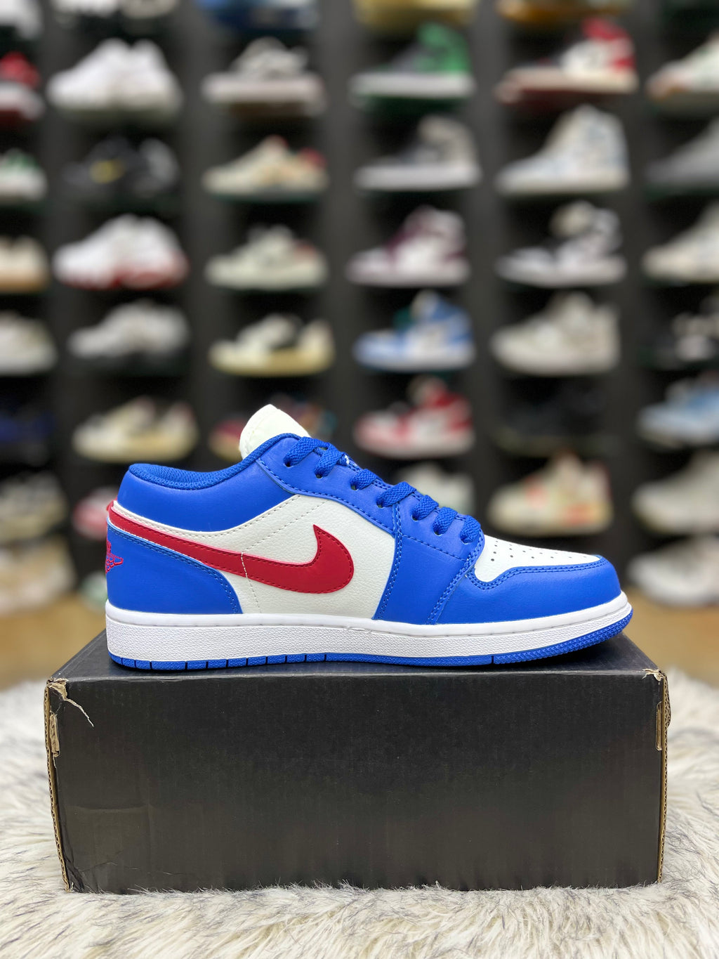 Nike Air Jordan 1 Low sneaker in a sport blue and white