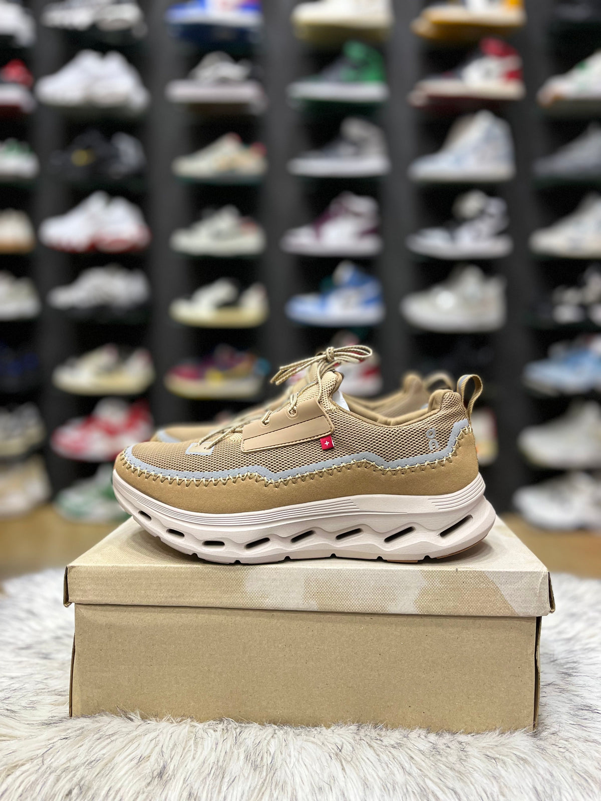 On Cloudaway sneakers in a bronze and tan colorway,
