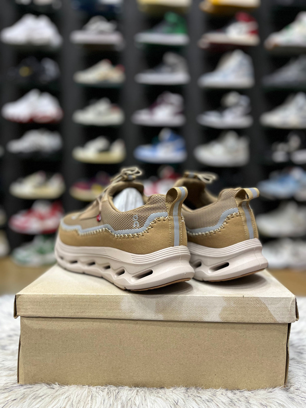 On Cloudaway sneakers in a bronze and tan colorway,