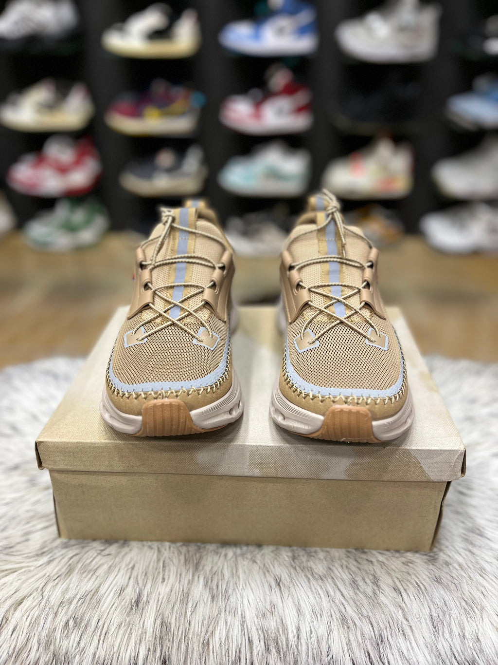 On Cloudaway sneakers in a bronze and tan colorway,