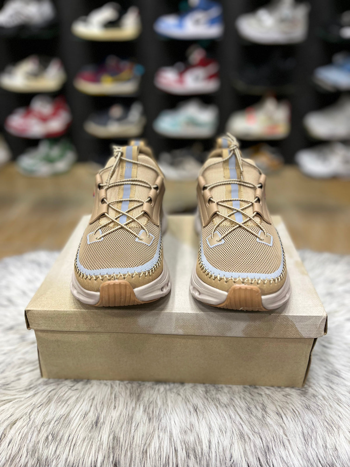On Cloudaway sneakers in a bronze and tan colorway,