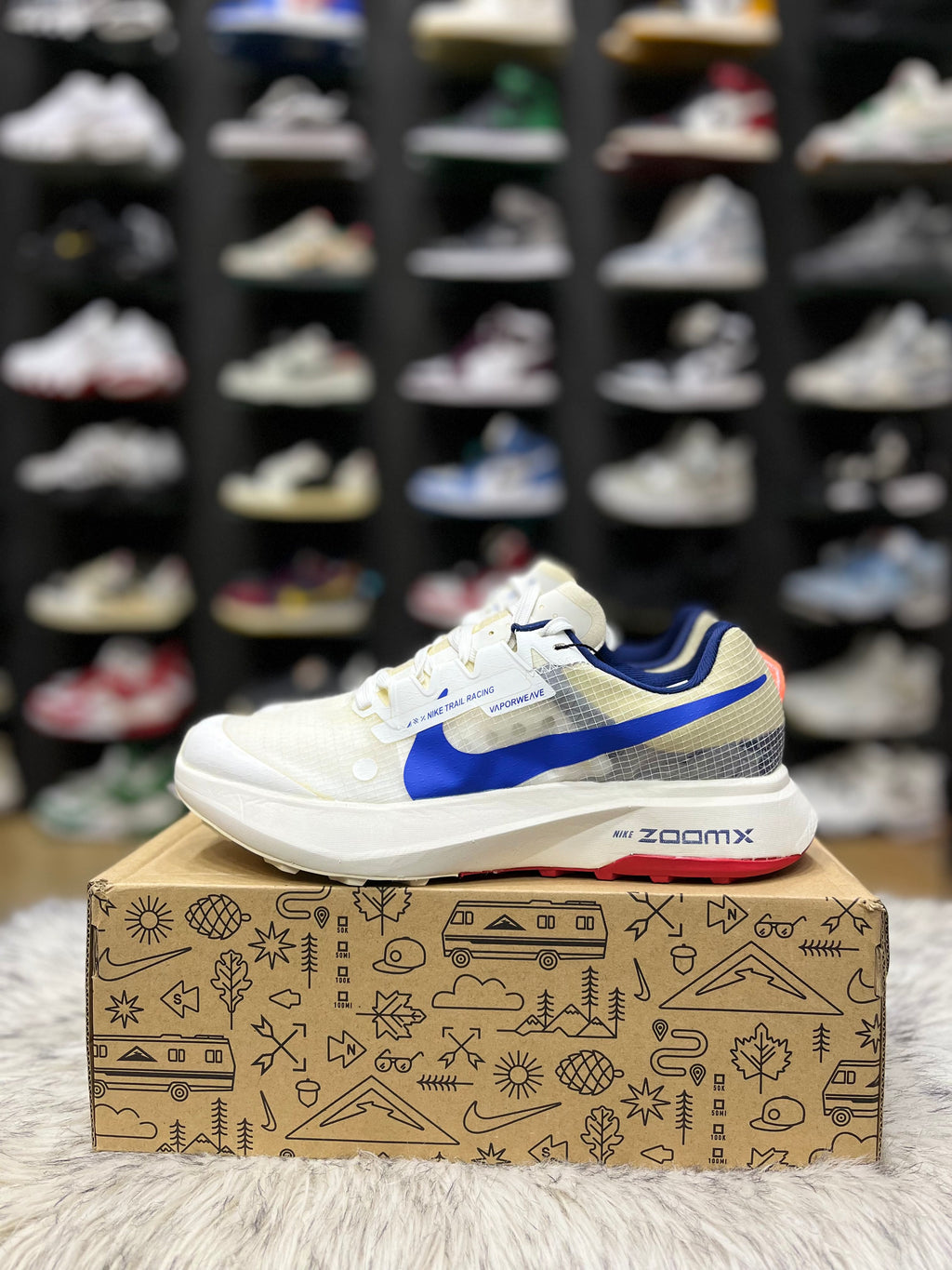 Nike ZoomX Ultrafly Trail running shoe in a white and blue