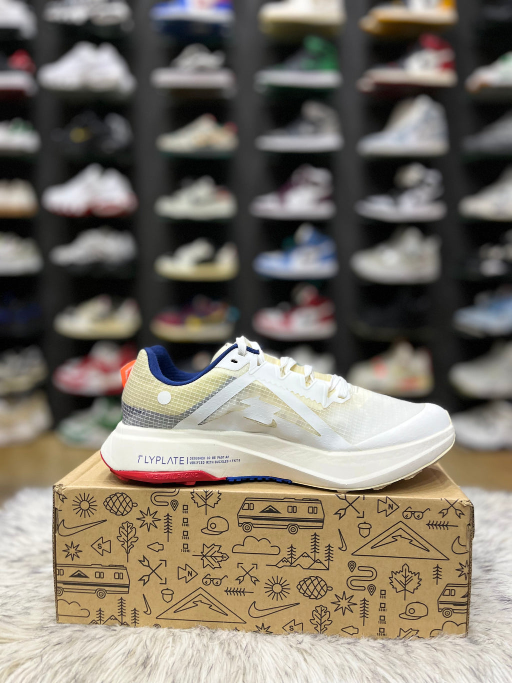 Nike ZoomX Ultrafly Trail running shoe in a white and blue