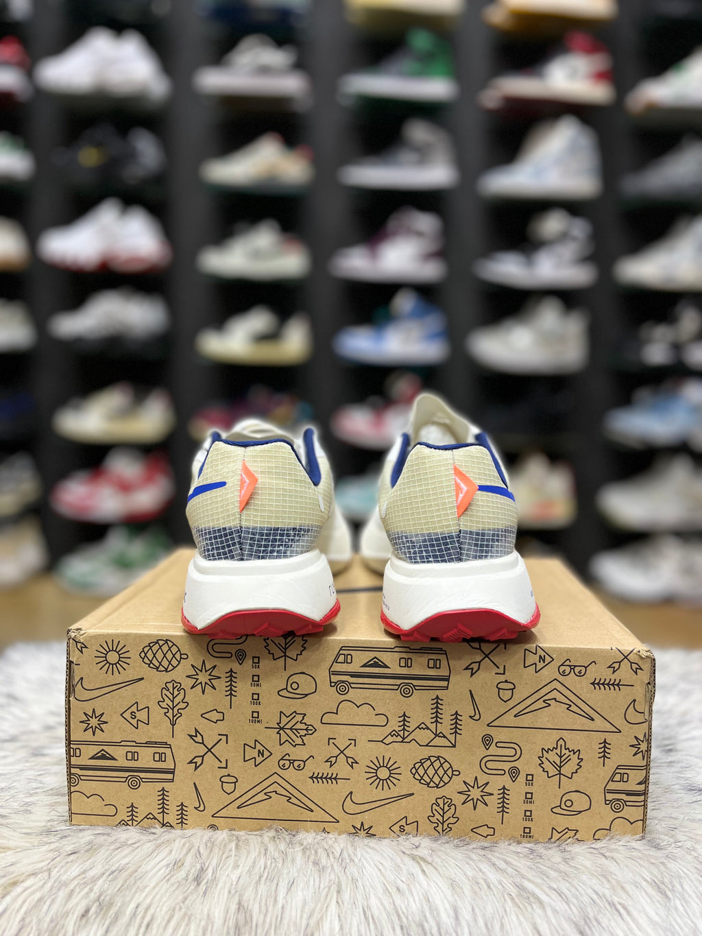 Nike ZoomX Ultrafly Trail running shoe in a white and blue