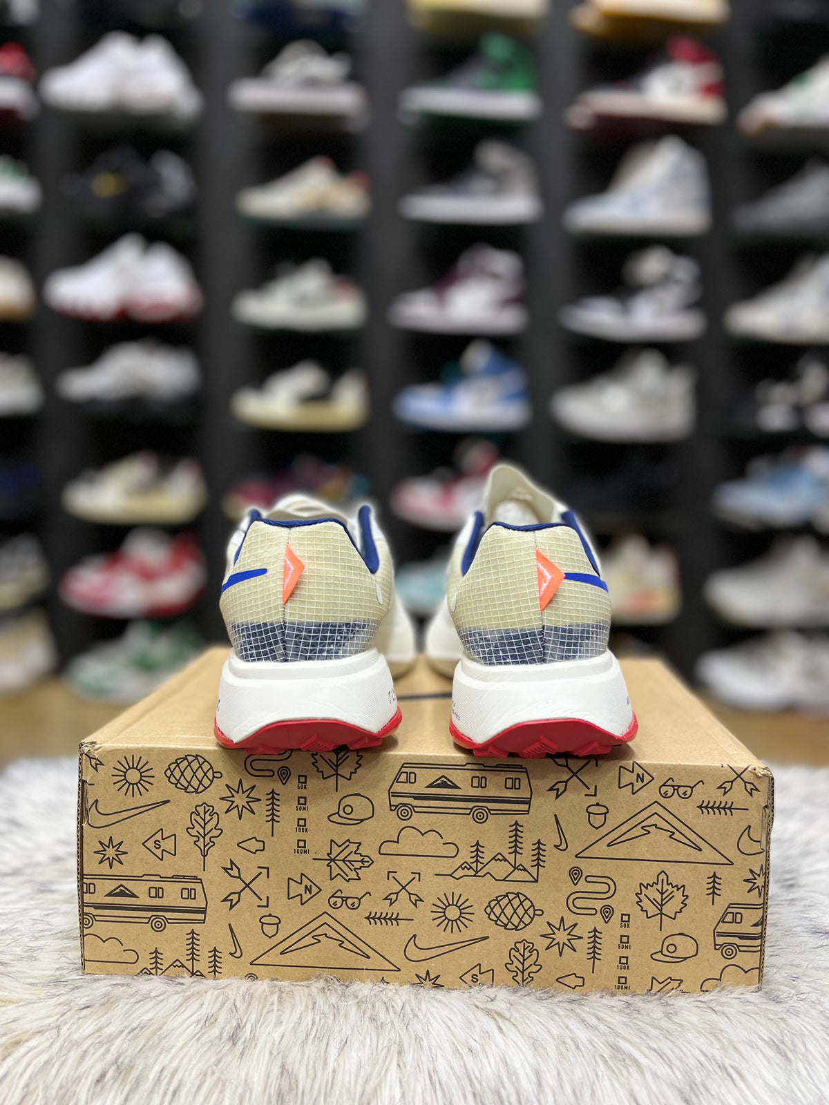 Nike ZoomX Ultrafly Trail running shoe in a white and blue