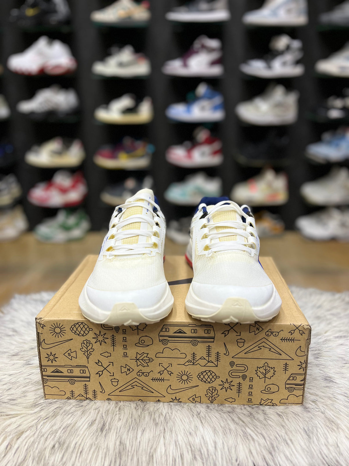 Nike ZoomX Ultrafly Trail running shoe in a white and blue